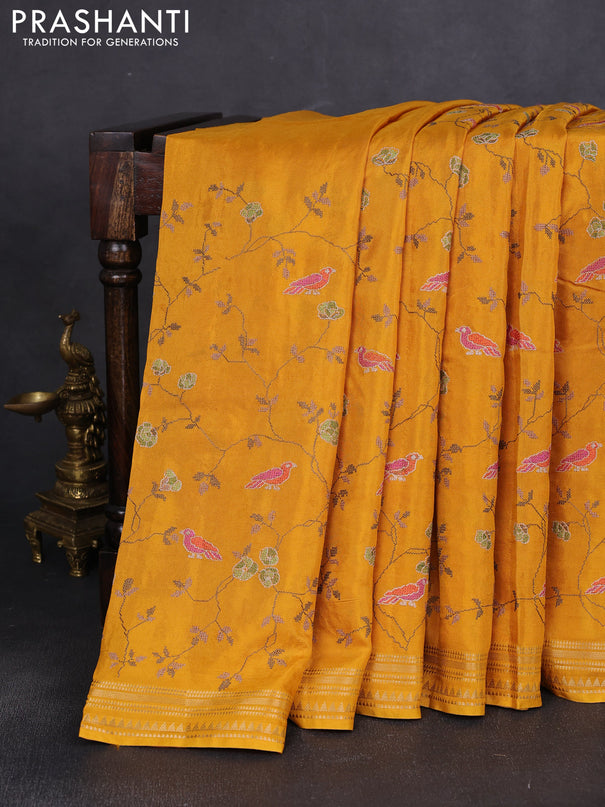 Semi crepe silk saree yellow with allover convent embroidery and temple zari woven border