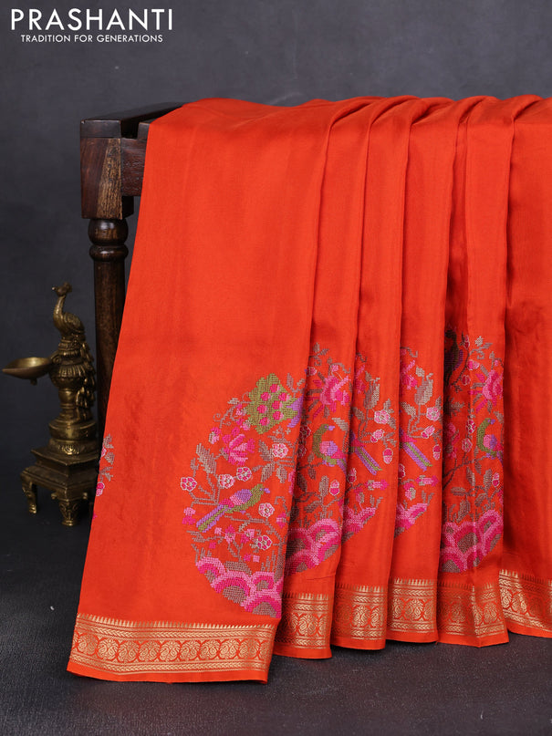 Semi crepe silk saree orange with convent embroidery and paisley zari woven border