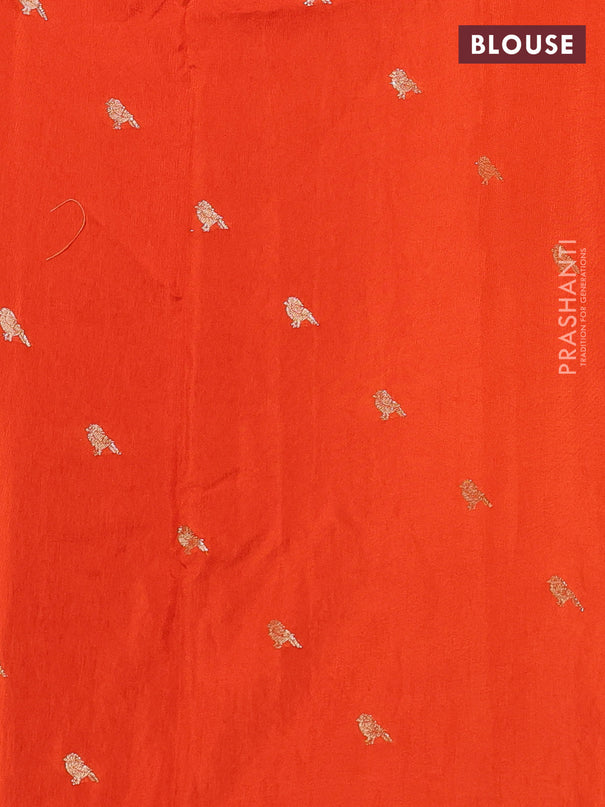 Semi crepe silk saree orange with convent embroidery and paisley zari woven border
