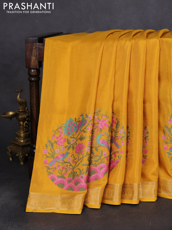Semi crepe silk saree yellow with convent embroidery and paisley zari woven border