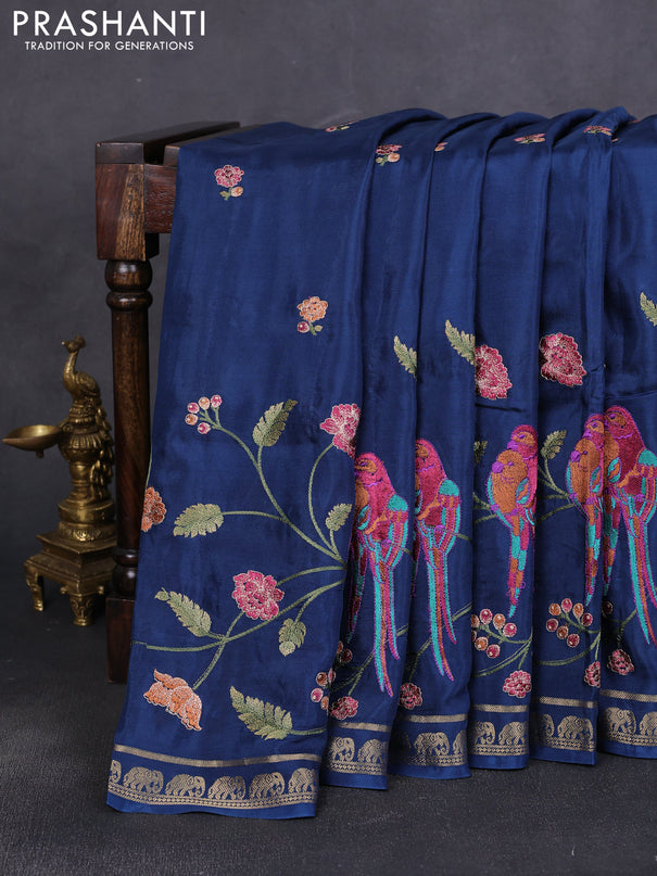 Semi crepe silk saree peacock blue with allover embroidery and elephant zari woven border