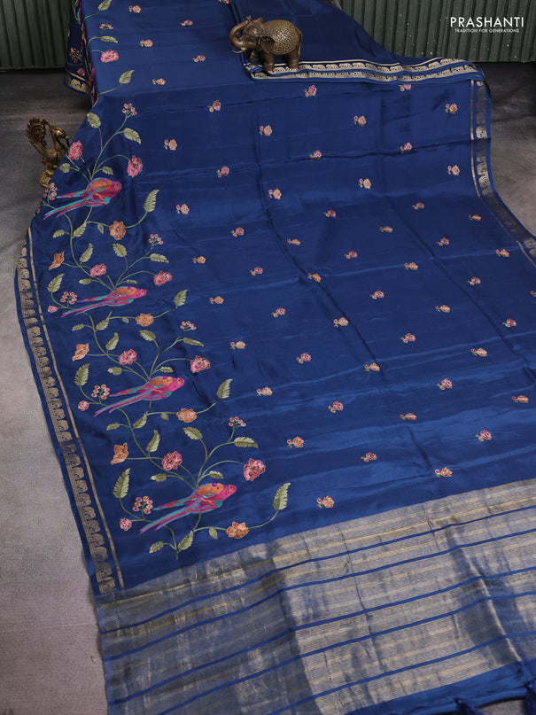 Semi crepe silk saree peacock blue with allover embroidery and elephant zari woven border