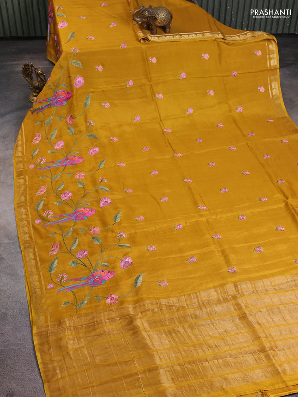 Semi crepe silk saree yellow with allover embroidery and elephant zari woven border
