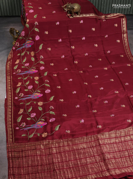 Semi crepe silk saree deep maroon with allover embroidery and elephant zari woven border