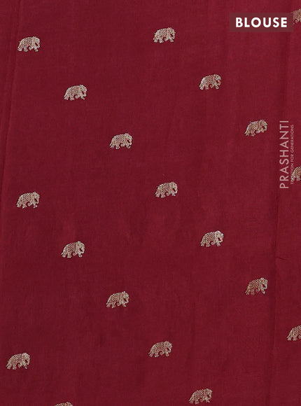 Semi crepe silk saree deep maroon with allover embroidery and elephant zari woven border