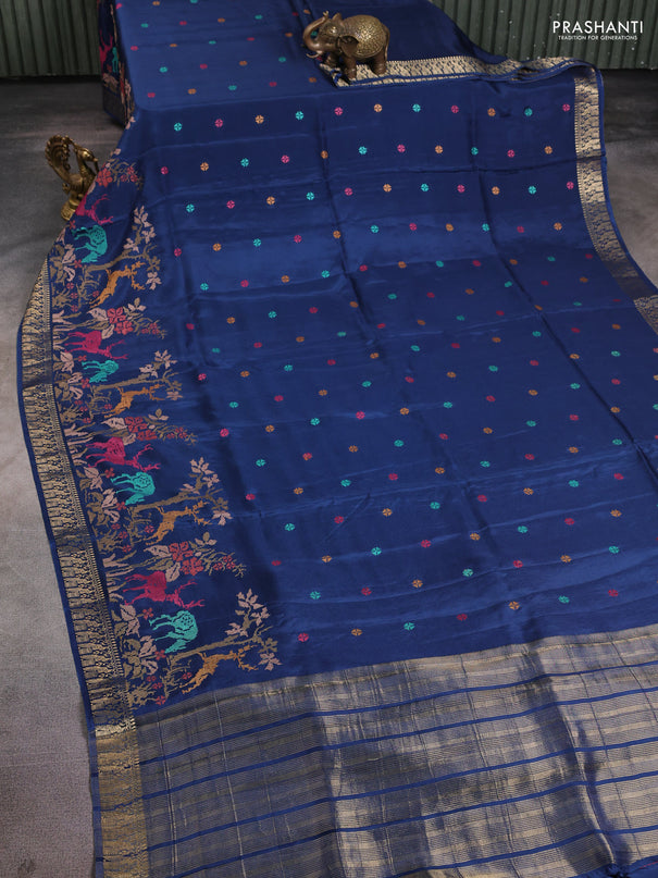 Semi crepe silk saree peacock blue with allover convent embroidery and peacock zari woven border