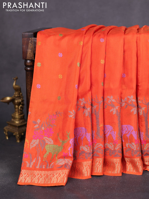 Semi crepe silk saree orange with allover convent embroidery and peacock zari woven border