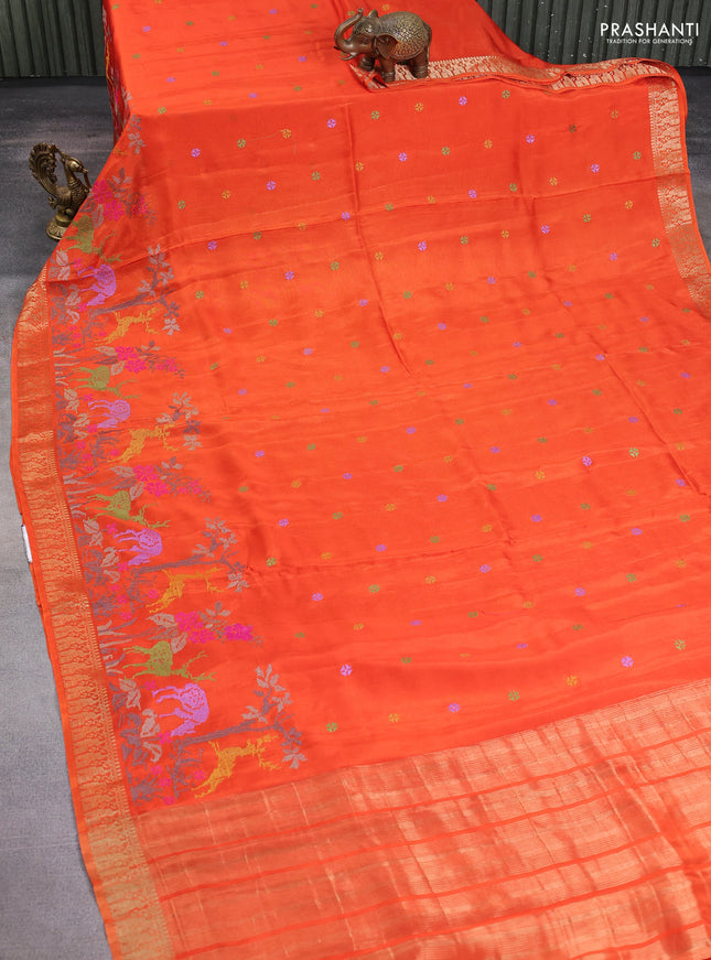 Semi crepe silk saree orange with allover convent embroidery and peacock zari woven border