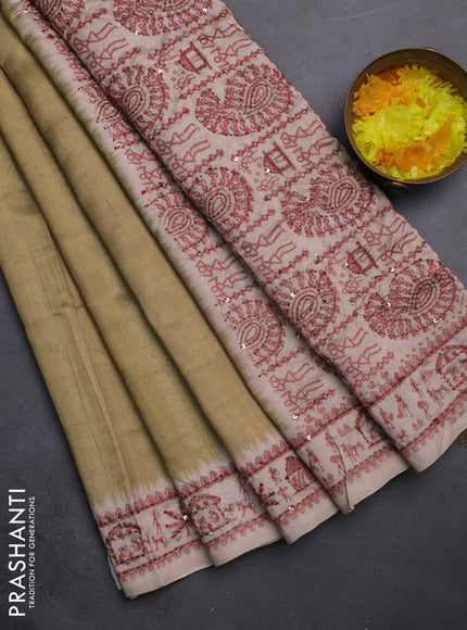 Semi tussar saree sap green and beige with plain body and warli prints kantha stitch work border