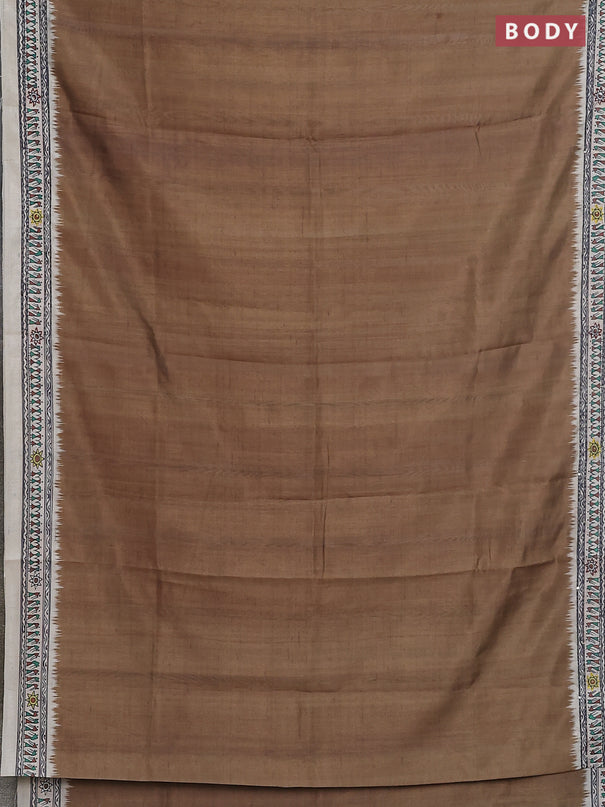 Semi tussar saree dark mehendi green and cream with plain body and warli prints kantha stitch work border