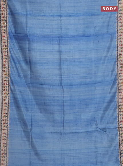 Semi tussar saree cs blue and beige with plain body and warli prints kantha stitch work border