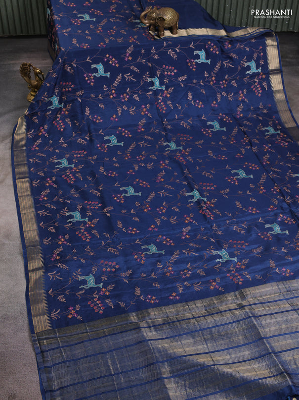 Semi crepe silk saree peacock blue with allover convent embroidery and temple zari woven border