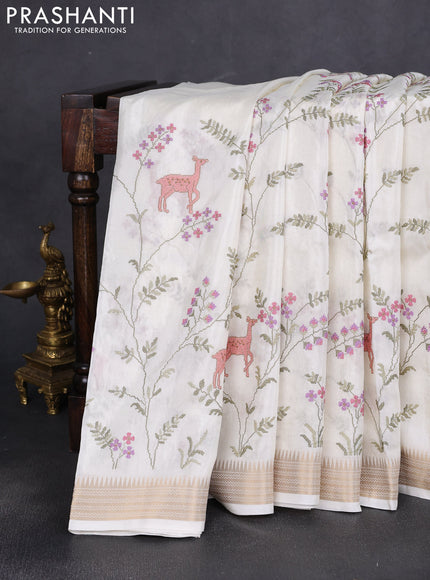 Semi crepe silk saree off white with allover convent embroidery and temple zari woven border