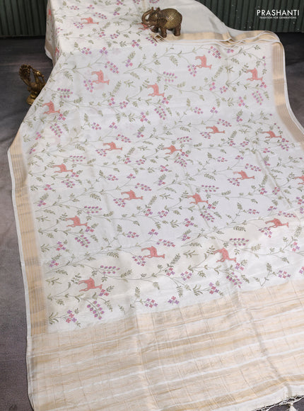 Semi crepe silk saree off white with allover convent embroidery and temple zari woven border