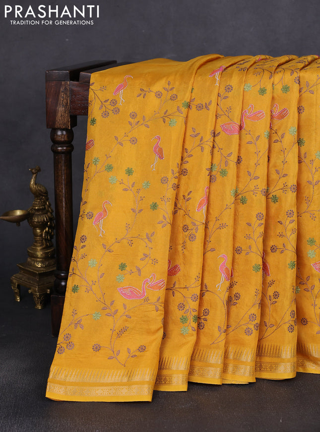 Semi crepe silk saree yellow with allover convent embroidery and temple zari woven border