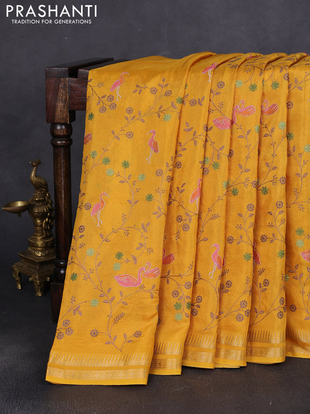 Semi crepe silk saree yellow with allover convent embroidery and temple zari woven border