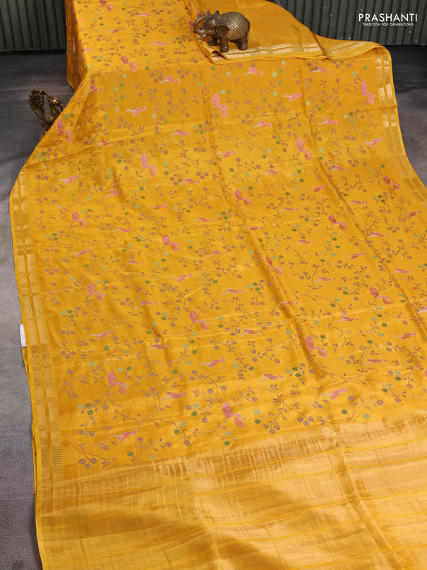 Semi crepe silk saree yellow with allover convent embroidery and temple zari woven border