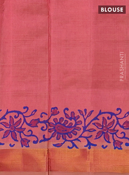 Silk cotton block printed saree dual shade of peach with allover prints and zari woven border
