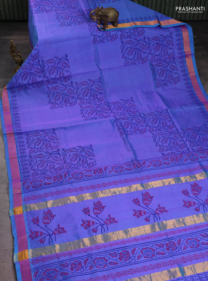 Silk cotton block printed saree dual shade of bluish violet with prints and long printed zari woven border