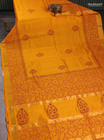 Silk cotton block printed saree mango yellow with butta prints and long printed zari woven border