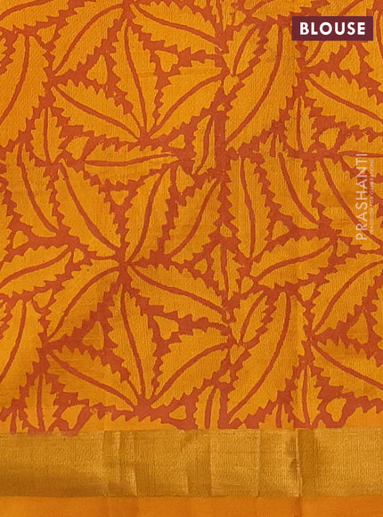 Silk cotton block printed saree mango yellow with butta prints and long printed zari woven border