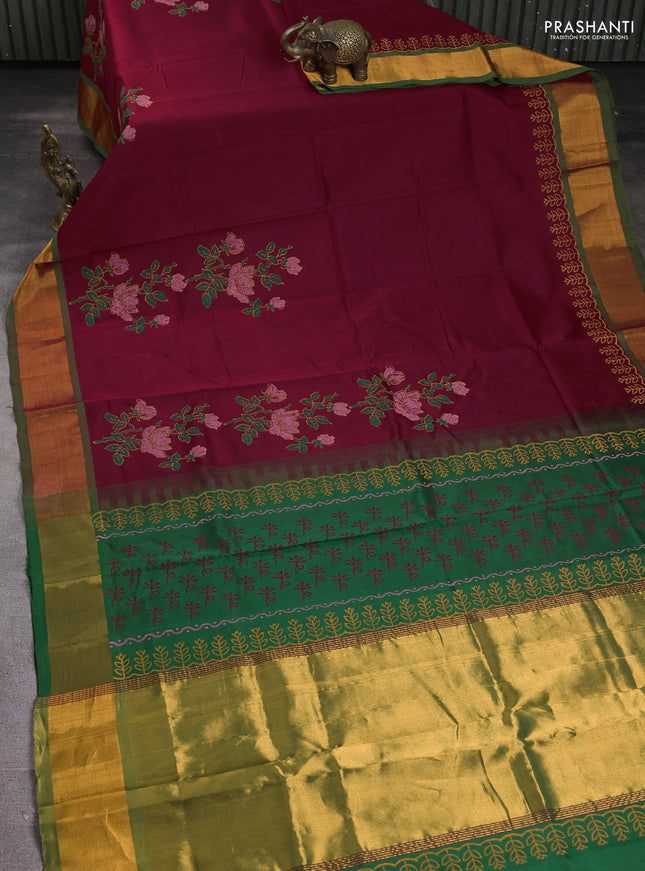 Silk cotton block printed saree maroon and green with floral prints and zari woven border