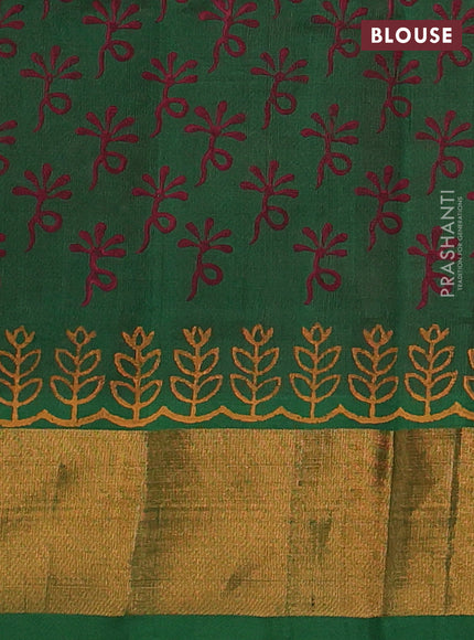 Silk cotton block printed saree maroon and green with floral prints and zari woven border