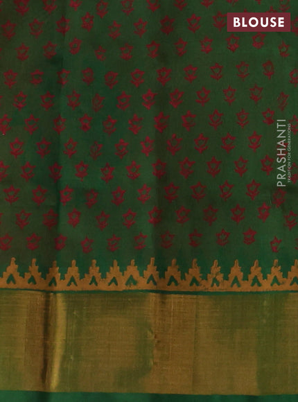 Silk cotton block printed saree orange and green with prints and zari woven border