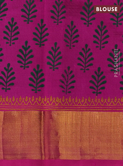 Silk cotton block printed saree bottle green and pink with floral butta prints and zari woven border