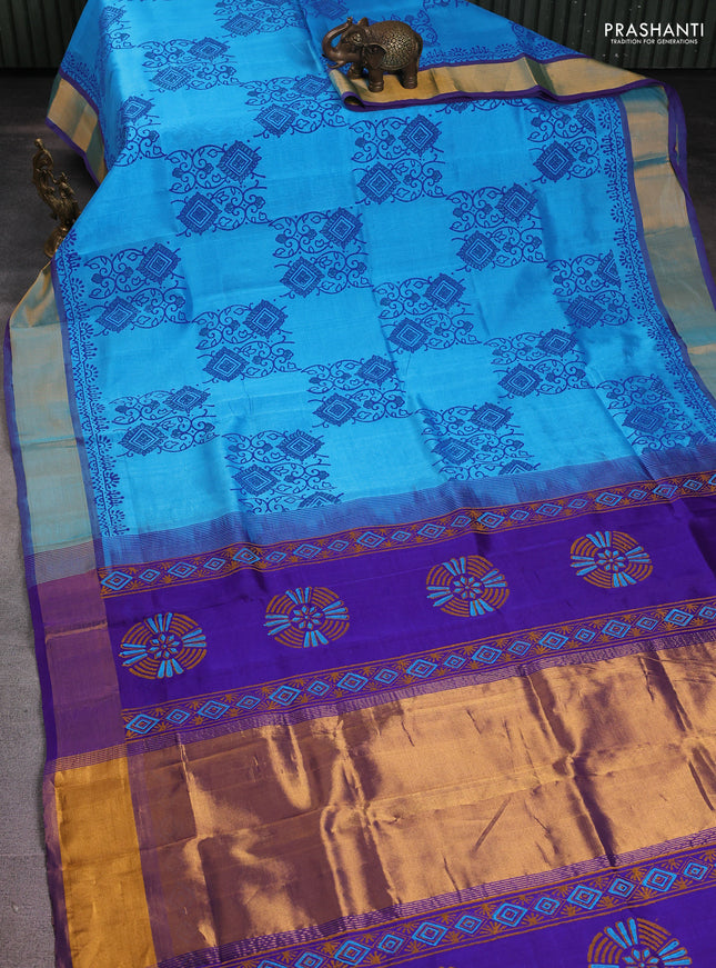 Silk cotton block printed saree light blue and violet with prints and zari woven border