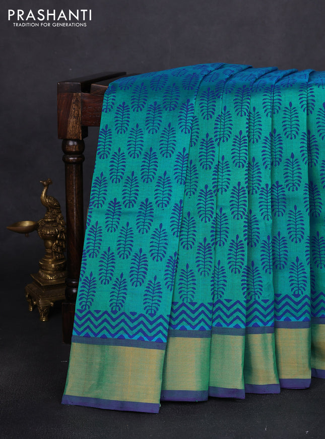 Silk cotton block printed saree teal blue and violet with allover butta prints and zari woven border
