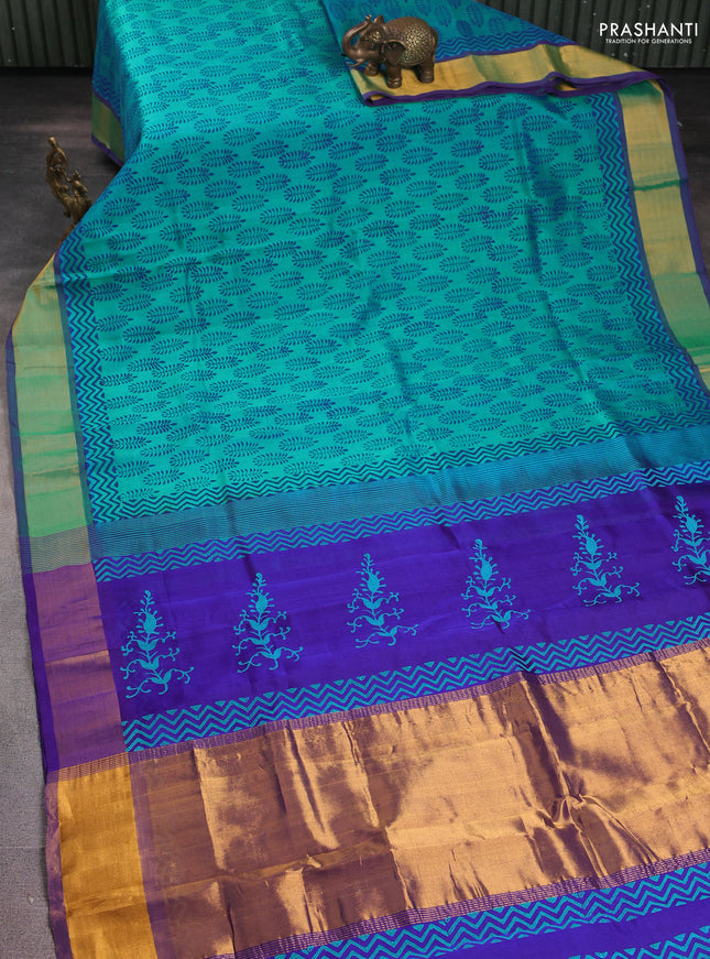 Silk cotton block printed saree teal blue and violet with allover butta prints and zari woven border