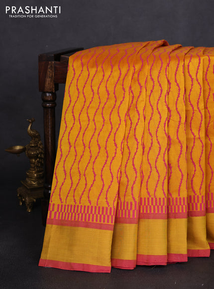 Silk cotton block printed saree mango yellow and pink with allover prints and zari woven border