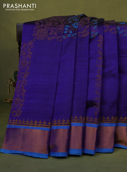 Silk cotton block printed saree blue and cs blue with allover prints and zari woven border