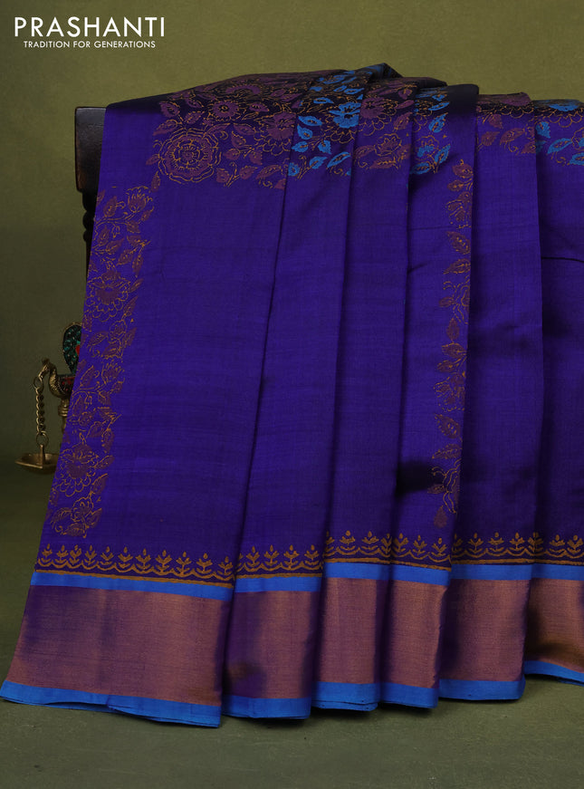 Silk cotton block printed saree blue and cs blue with allover prints and zari woven border