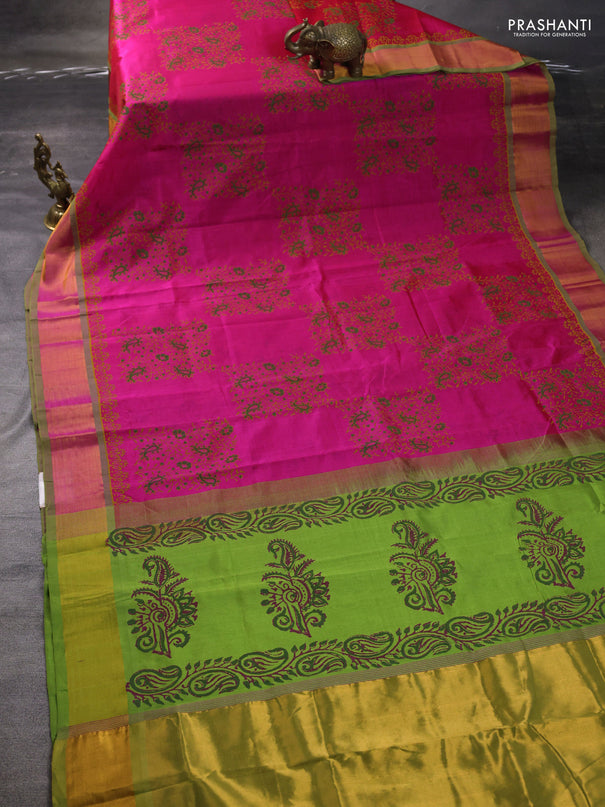 Silk cotton block printed saree pink and light green with allover prints and zari woven border
