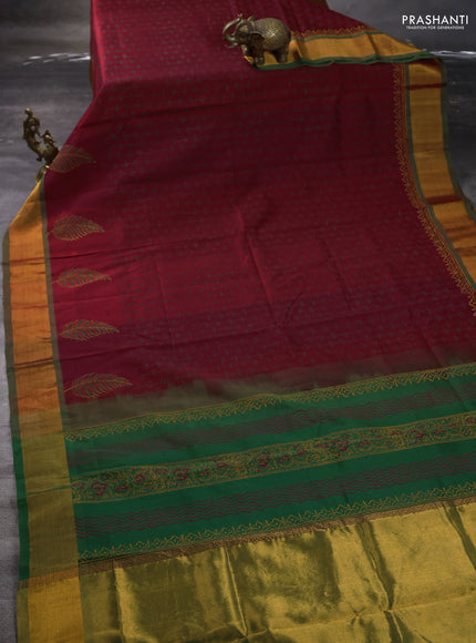Silk cotton block printed saree maroon and green with allover prints and zari woven border