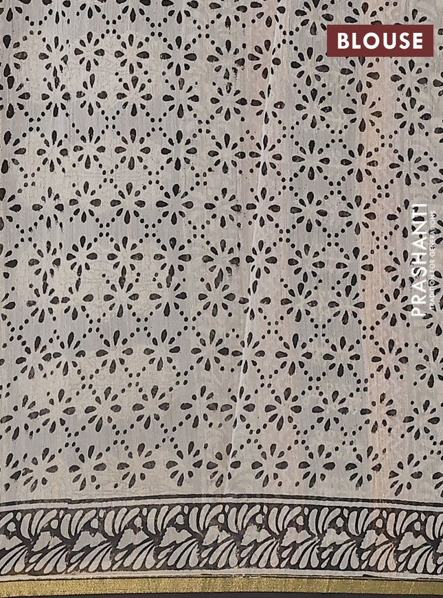 Chanderi bagru saree black with allover floral prints and small zari woven border