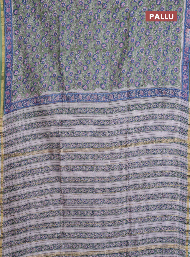 Chanderi bagru saree pastel green with allover floral prints and small zari woven border