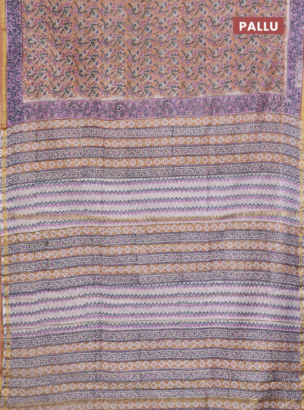 Chanderi bagru saree sandal and lavender with allover floral prints and small zari woven border