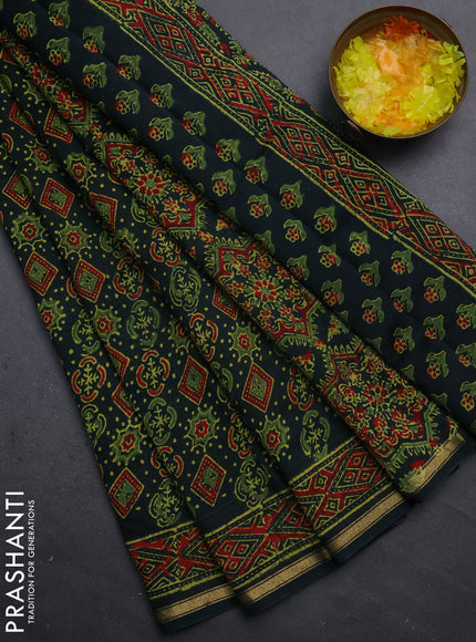 Chanderi bagru saree bottle green with allover ajrakh prints and small zari woven border