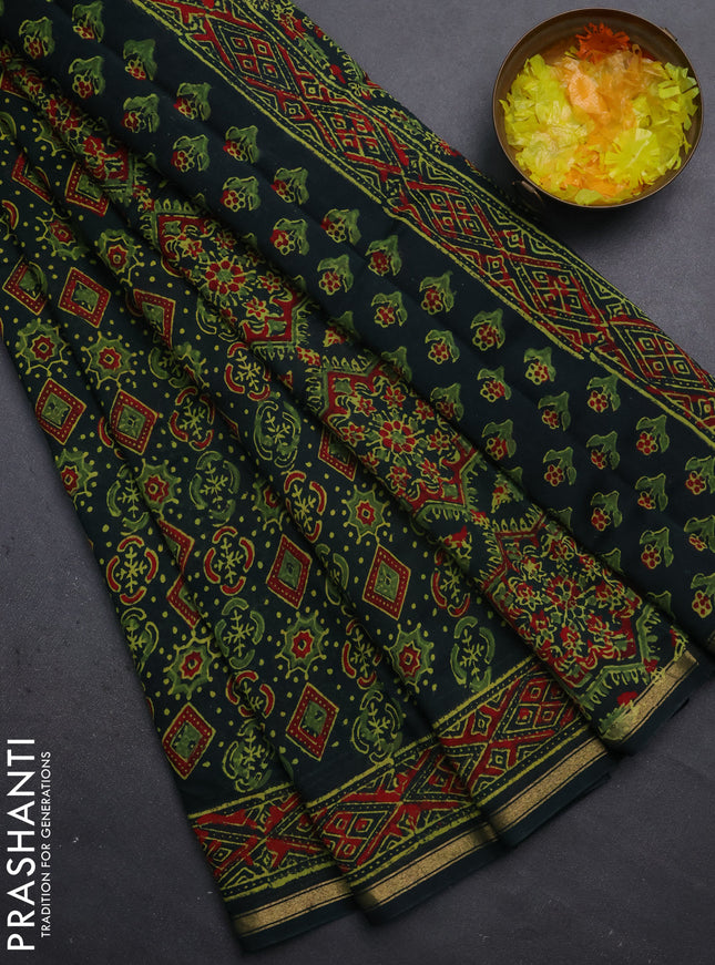 Chanderi bagru saree bottle green with allover ajrakh prints and small zari woven border