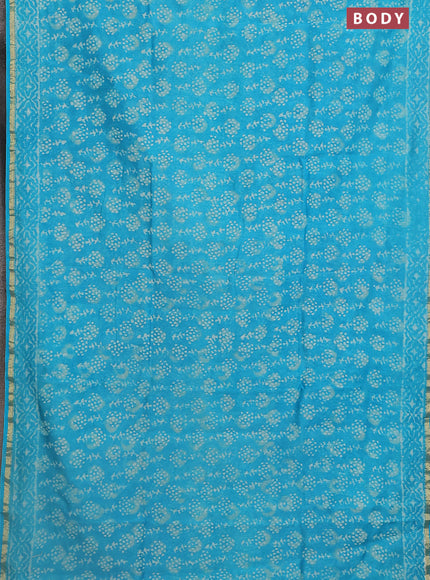 Chanderi bagru saree teal blue with allover dabu prints and small zari woven border