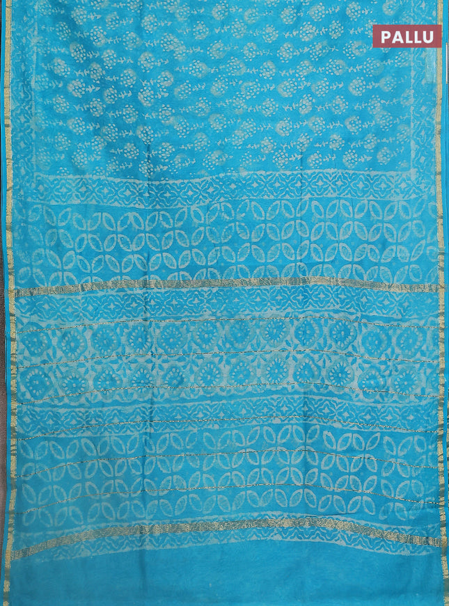 Chanderi bagru saree teal blue with allover dabu prints and small zari woven border