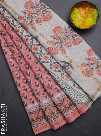 Chanderi bagru saree peach pink with floral butta prints and small zari woven border