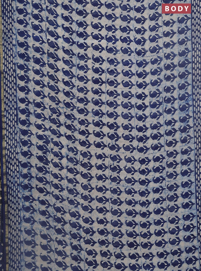 Chanderi bagru saree beige and blue with allover dabu prints and small zari woven border