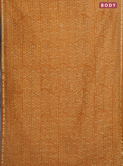 Chanderi bagru saree mustard yellow with allover dabu prints and small zari woven border