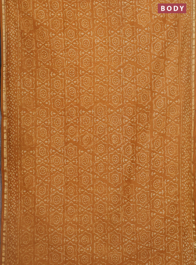 Chanderi bagru saree mustard yellow with allover dabu prints and small zari woven border