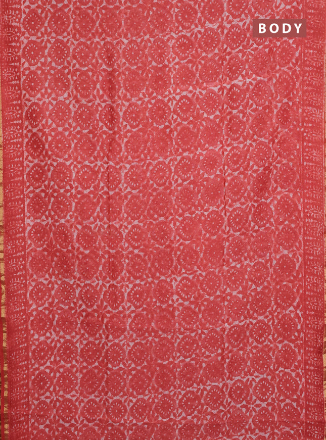 Chanderi bagru saree orange with allover dabu prints and small zari woven border