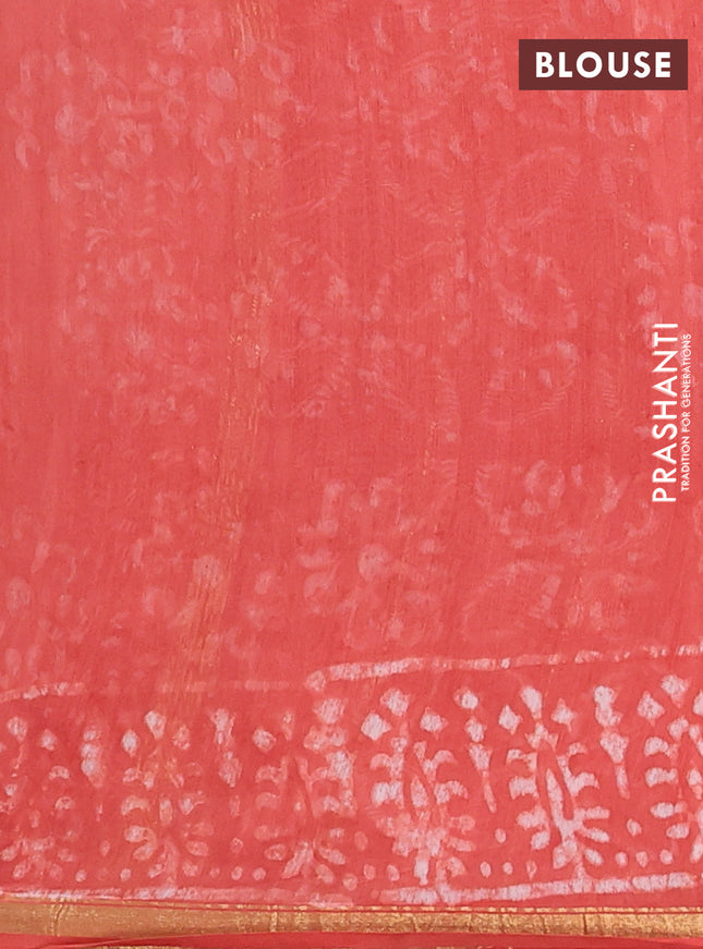 Chanderi bagru saree orange with allover dabu prints and small zari woven border